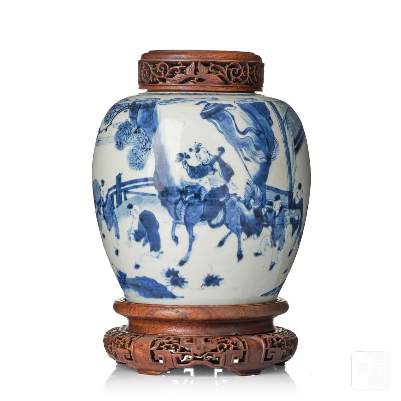 A blue and white 'boys at play' jar,